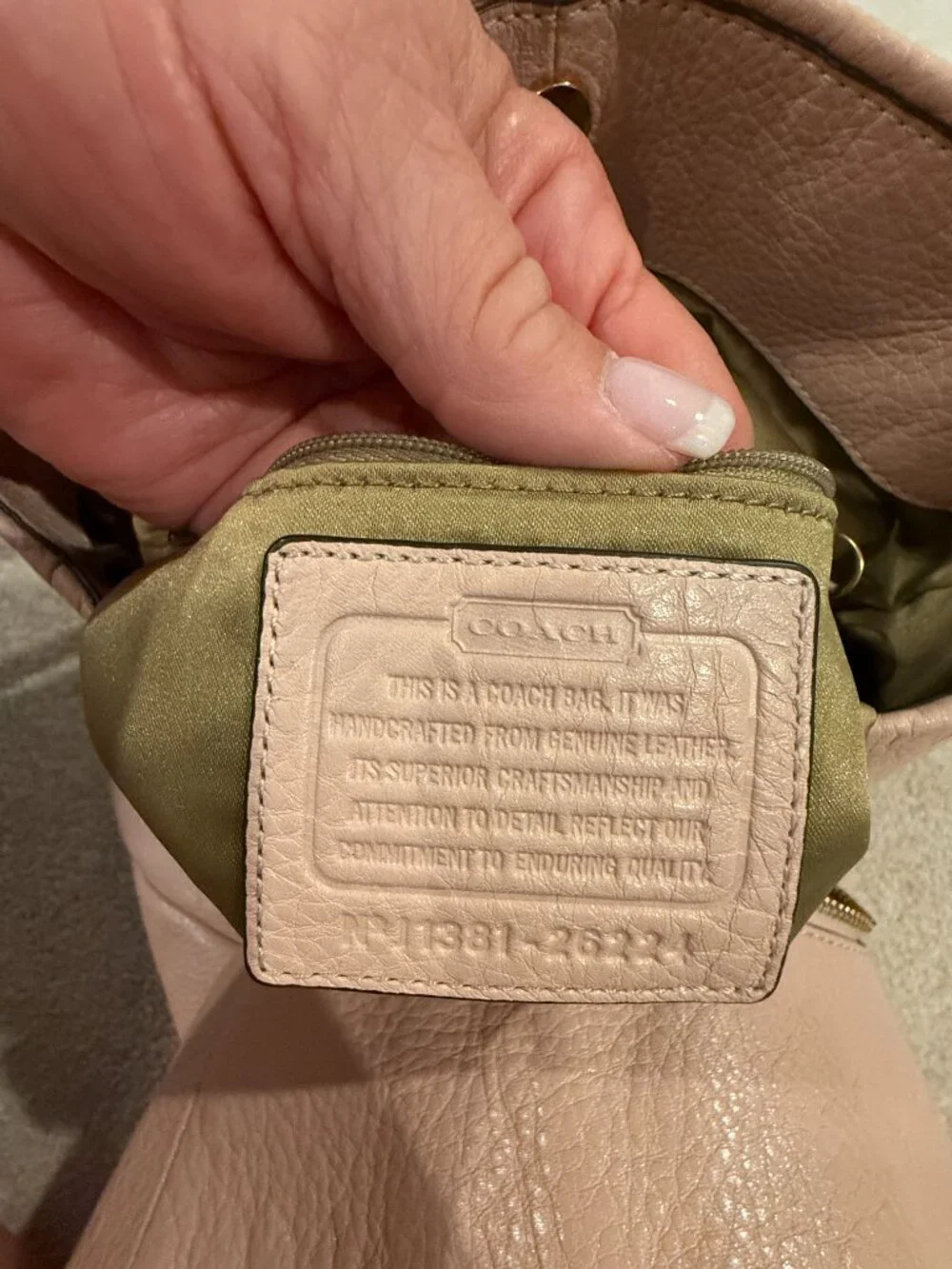 Coach Madison Phoebe handbag, featured in a soft blush pink pebbled leather